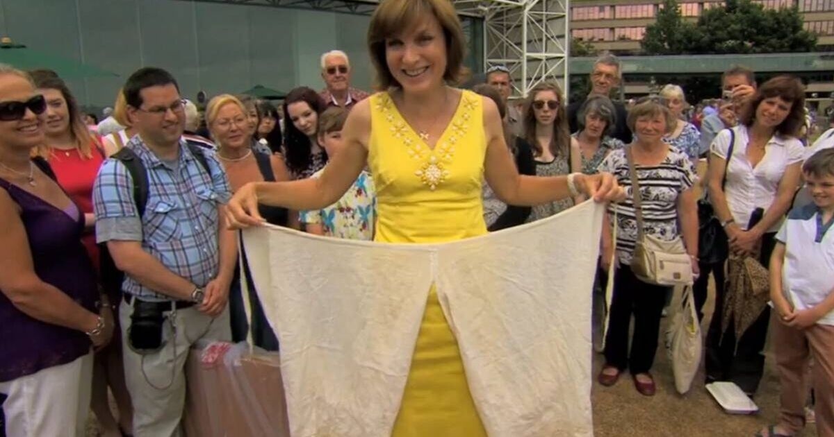 Antiques Roadshow star sniggers as she shows off Queen Victoria's 'crotchless' knickers
