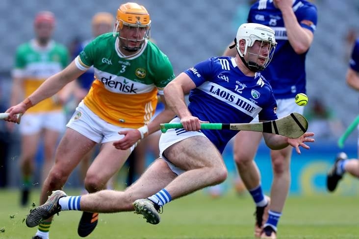 Rugby background standing to Dooley
