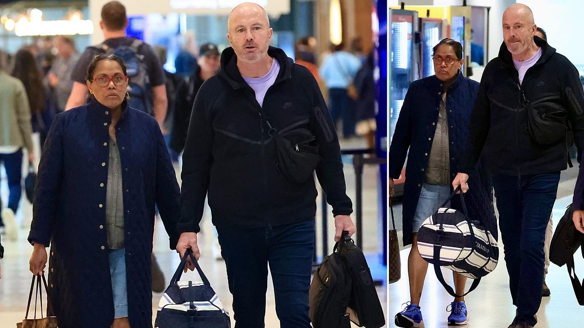 Cathy Freeman is spotted out with her mystery man AGAIN just after making a rare public appearance in front of thousands of fans