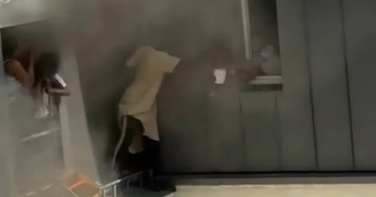 ​Incredible moment hero caretaker saves four babies from apartment fire in Paris