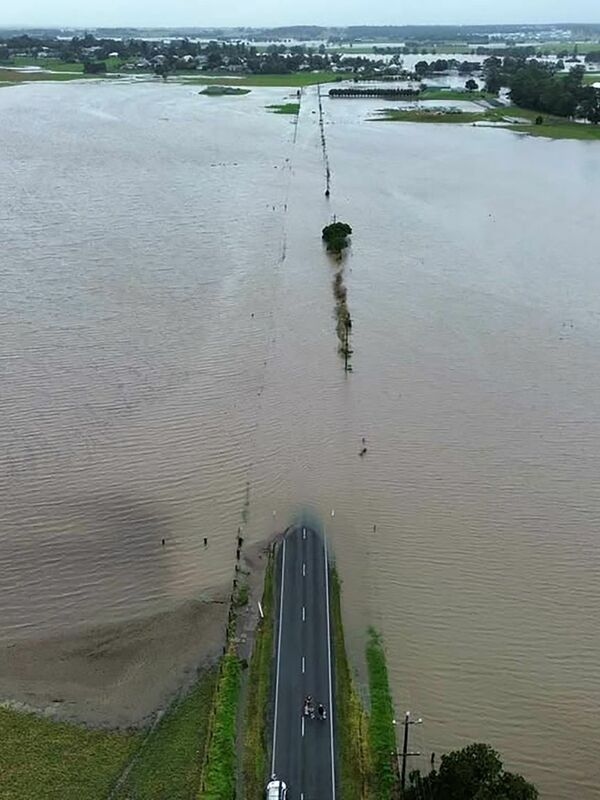 In the Australian state of New South Wales, many people are waiting on their roofs for rescue.
