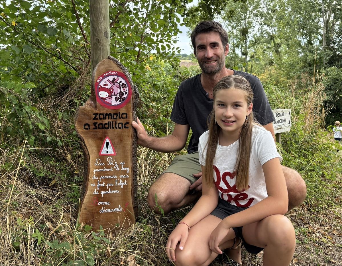 A father and daughter create a temporary Tèrra Aventura trail in Sadillac