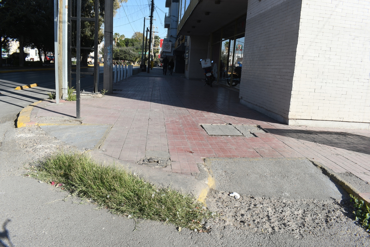 They urge people to report obstructed sidewalks that endanger pedestrians.