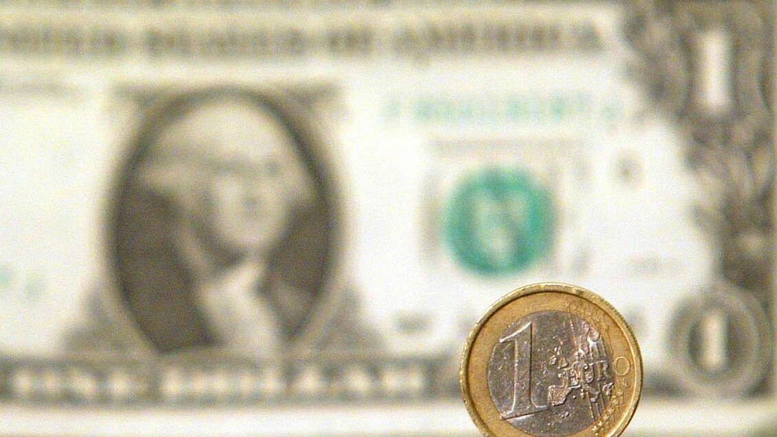 Euro down at start, trading at $1.1221