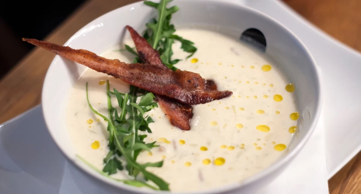 Cream of corn with fresh coriander and crispy bacon