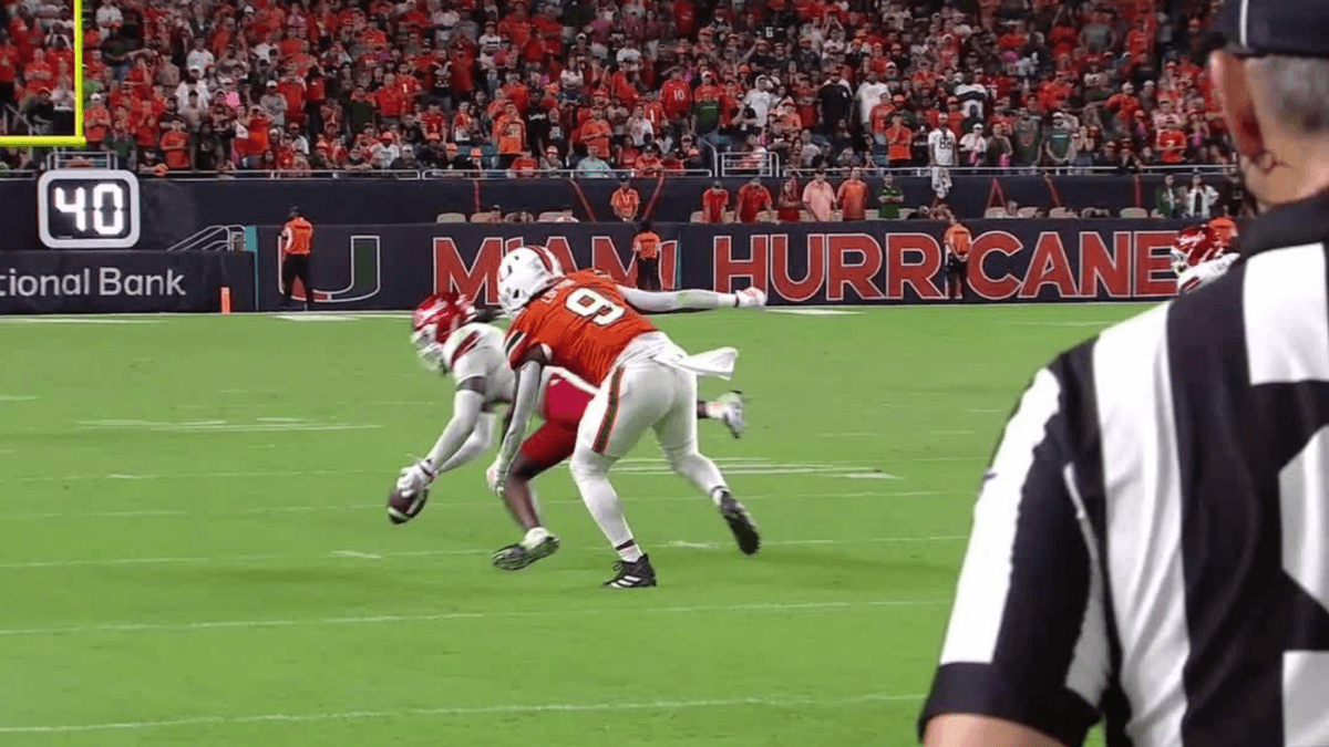 WATCH: Louisville LB T.J. Capers hauls in play-of-the-year candidate INT to clinch upset win over No. 2 Miami
